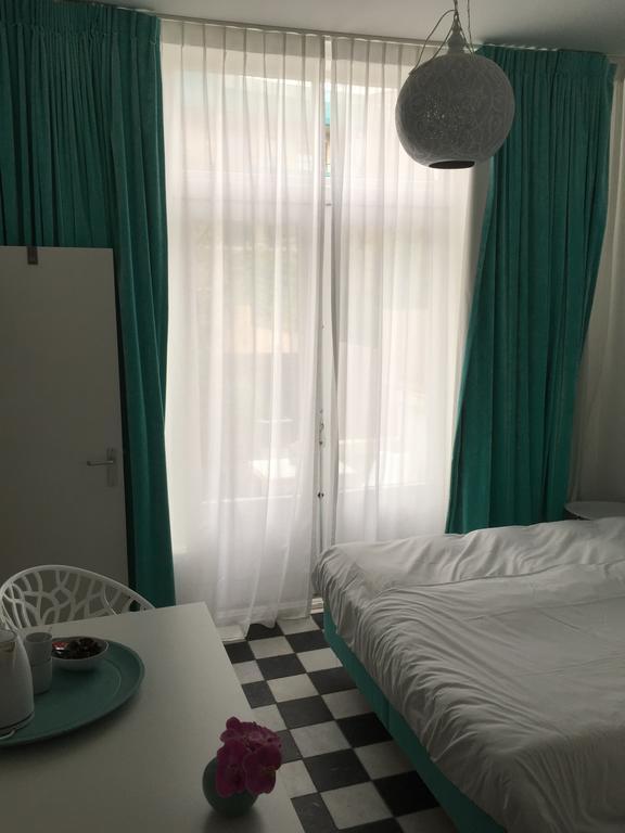 Hotel Zeespiegel Зандфорт Экстерьер фото